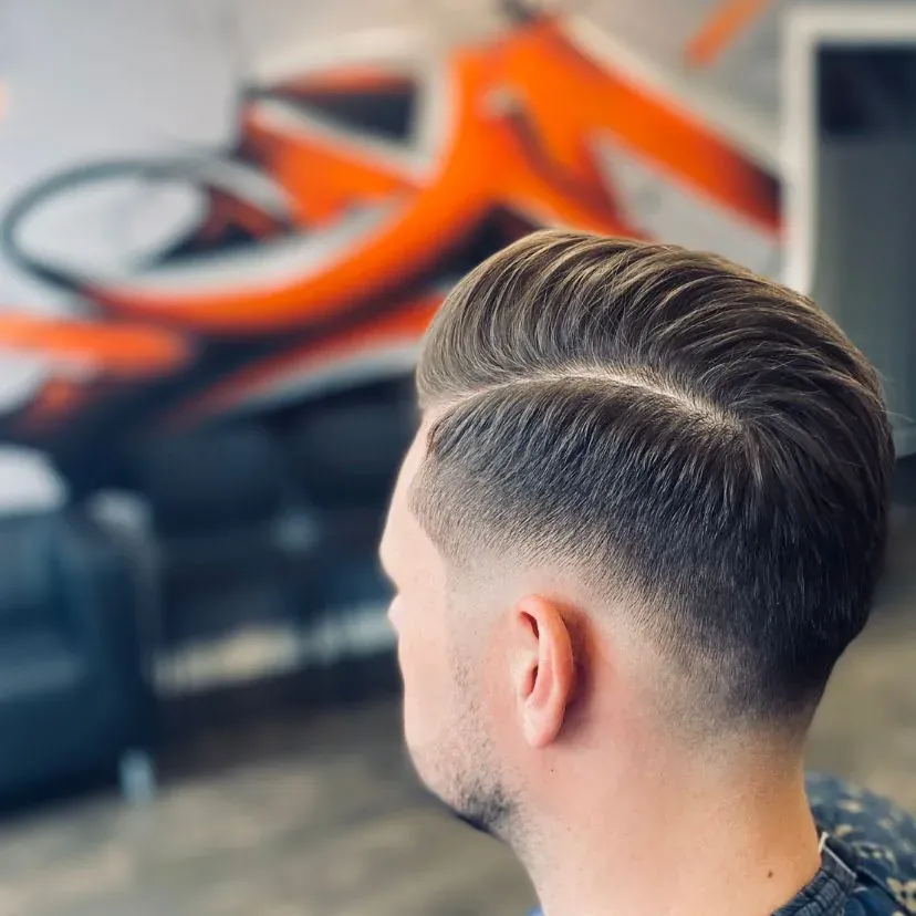 A skin fade from behind, by the mural